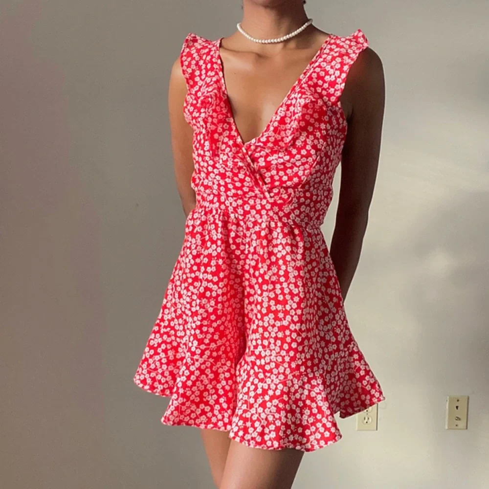 Red Ditsy Floral Romper with Open Back Detail - Picture 1 of 4